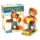 Teddy the Champ Boxer: A boxed, battery operated, tin and fur, Teddy the Boxing Bear, Made by