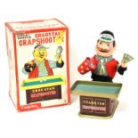 Crapshooter: A boxed, battery operated, tinplate, Cragstan Crapshooter, Made by Yonezawa, Japan