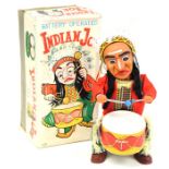 Indian Joe: A boxed, battery operated, tinplate, Indian Joe with War Drum, Made by RF, for Alps,