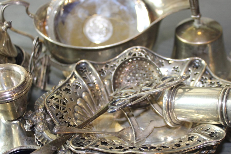 A collection of silver table ware, to include; a silver sauce boat, by Adie Brothers Ltd, assayed