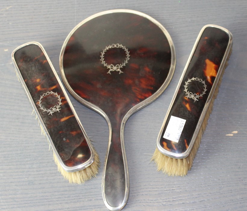 A silver mounted tortoiseshell part dressing set, by Henry Mathews, assayed Birmingham 1923,