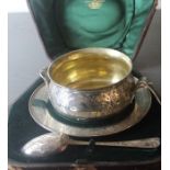 A Victorian cased Scottish silver christening set, comprising twin handled circular bowl, saucer and