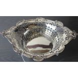 A silver table basket, by William Aitken, assayed Birmingham 1904, of pierced navette form, with