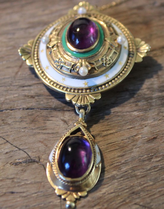 A 9ct. yellow gold, enamel, amethyst and seed pearl pendant, of domed oval form with oval cabochon