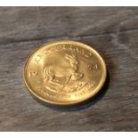 A 1974 Krugerrand 1oz. gold coin.
