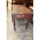**AWAY** A 20th century drop leaf table with I drawer.
