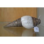 A Tibetan Shankha conch shell, applied with embossed brass work, set with coral and turquoise,