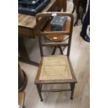 **AWAY** A cane seat ladder back occasional chair.