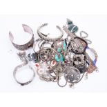 A collection of ethnic style white metal jewellery to include stone items such as turquoise type