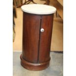 A late 19th Century mahogany marble top cylindrical plate warmer, single shelf interior