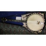 A Vega four string banjo, chevron string resorator, case S/D