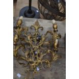 Two gilt metal wall sconces, floral form