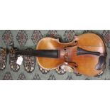 A violin (with Stradivarius label) with case and bow