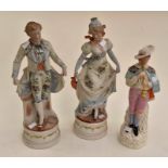 Two Continental figures, male and a female and a Staffordshire figure A/F