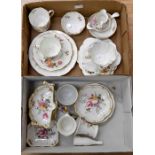A collection of Royal Crown Derby Derby Posies tea ware including cups, saucers, miniature jug,