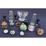 A collection of glasswares, all 20th Century, including paperweights, bowl, cats and early 20th