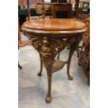 Late 19th Century side table, with cast iron base depicting Britannia and Barbary lions and mahogany