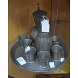 **REOFFER IN A&C NOV £20-£30** Norwegian pewter decanter set and six tots, plus tray, an Art Deco