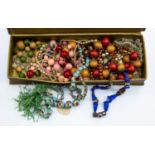 Chinese 1920's bead necklace and other necklaces within vintage chocolate box (Q)