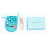 A collection of silver Tiffany items to include a money clip, a bookmark in the form of computer,