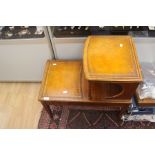 **AWAY** A 1950/60's two tier telephone table with leather inserts, mahogany