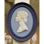 A Wedgwood two tone blue Jasper Ware wall plaque, depicting Her Majesty The Queen Elizabeth II,