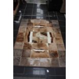 South African skin patched rug, various hides, 170 cms x 125 cms approx