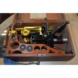 Early 20th Century microscope in wooden case made by J. Swift and Son, London, 29cm high