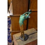 ** COLLECTED 25/10/19 BJ **An Art Deco style female figure in painted brass, approx 36 cms in