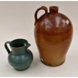 A large 19th Century stone ware flagon, single handle (A.F) together with a Buchan Pottery jug, 18cm