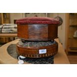A Victorian walnut and parquetry circular footstool and an octagonal footstool with hinged lid (2)