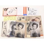 A collection of various portrait postcards, some bearing printed autographs to the front, together