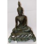 A seated bronze Buddha