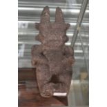 Carved demonesque stone figure A/F