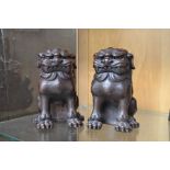 A pair of Chinese bronzed Dogs of Foe earthenware, 18cm high