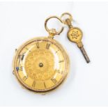 An18ct gold ladies pocket watch, gold tone dial with numerals, folitae decoration to dial and