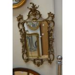 A 20th Century style gilt mirror, approx 105 cms long