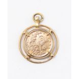 An Egyptian coin pendant mounted in unmarked yellow metal, probably  9ct gold, total gross weight