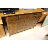 ***REOFFER NOV A&C £60/80*** An Oak sideboard in the Art Nouveau style on square tapered legs. Two