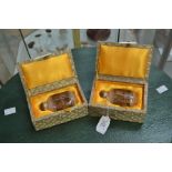 **REOFFER IN A&C NOV £30-£40** A pair of Chinese snuff bottles, boxed, intricately depicting town