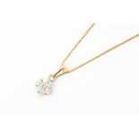 A 9ct gold and diamond cluster pendant, diamond weight approx. as per stamp 0.50, on a yellow