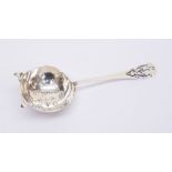 A silver tea strainer, Sheffield 1944,  A.E Poston & Co Ltd