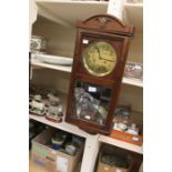 A German 8 day wall clock, mahogany cased