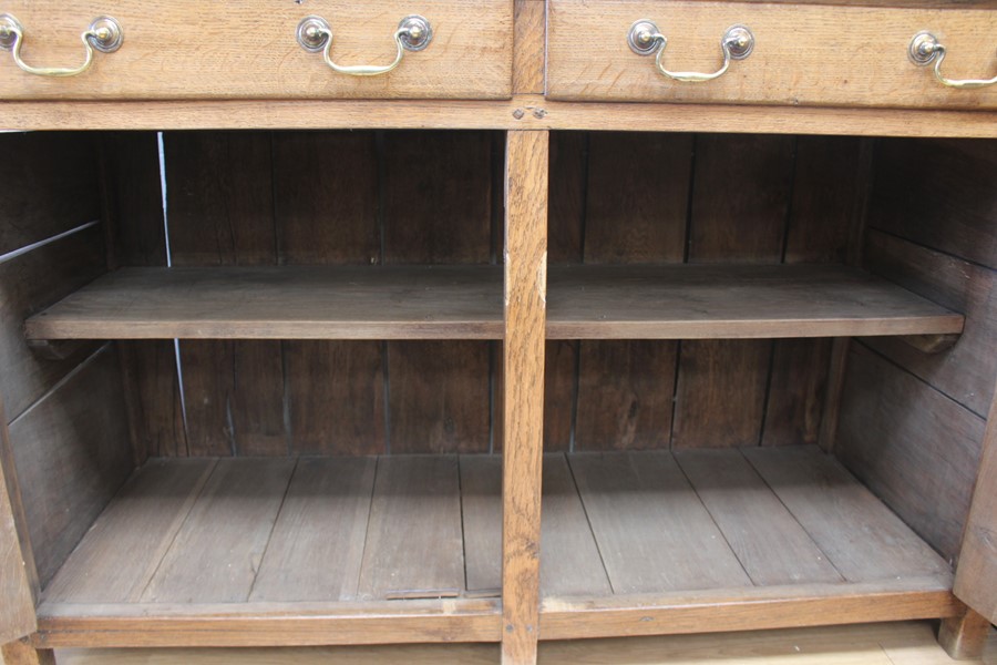 A  20th Century oak dresser and plate rack. The base having two drawers with brass handles and two - Image 5 of 5