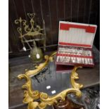 A French style painted wood cartouche shaped mirror; a brass servers bell on ornate stand and a 12