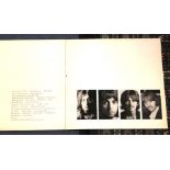 The Beatles "White Album" with poster, four picture cover, side opening, not numbered