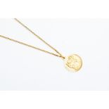 An 18ct gold St Christopher, round form, on a fine chain, length approx 24'', total gross weight
