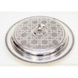 A large plated Middle Eastern serving dish with lid marked with Arabic script and S.A.D.F Islamic