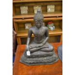 ** COLLECTED 25/10/19 BJ  ** A seated Buddhist figure, approx 38 cms in height, bronze finish