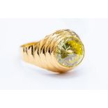 A yellow gold dress ring, with yellow stone, stamped 22ct, size V1/2, approx 6 grams